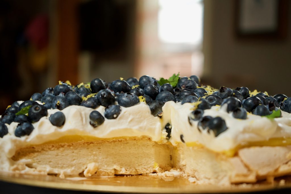 A tart, light, refreshing dessert that’s perfect for spring and summer. Soft cream, tart lemon curd, juicy blueberries and crunchy almonds combine to create the ultimate pavlova. 