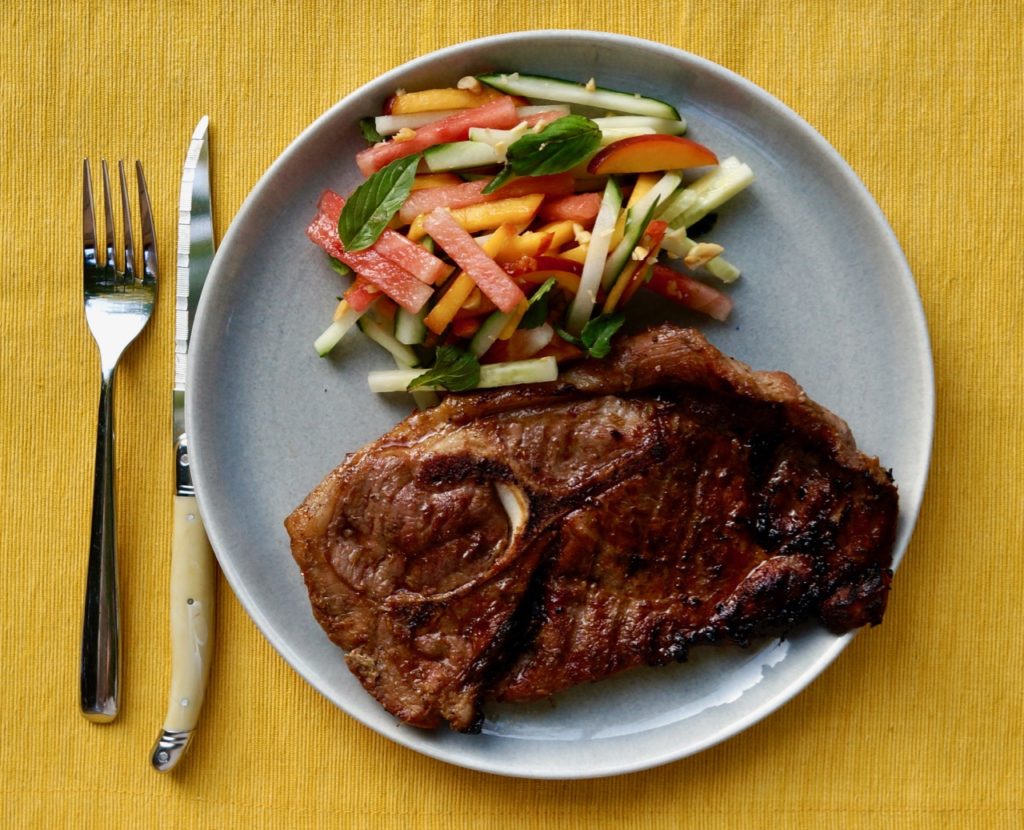 Lemongrass marinated grilled pork chops. Served with a salad, it's an easy weeknight meal. 