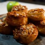 Easy sticky buns filled with apples and cinnamon. Delicious caramel and almonds top these buns to make a special breakfast treat.