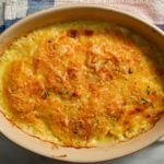 Golden brown gratin in baking dish.