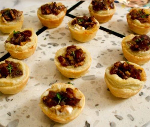 brie tartlets on marble board
