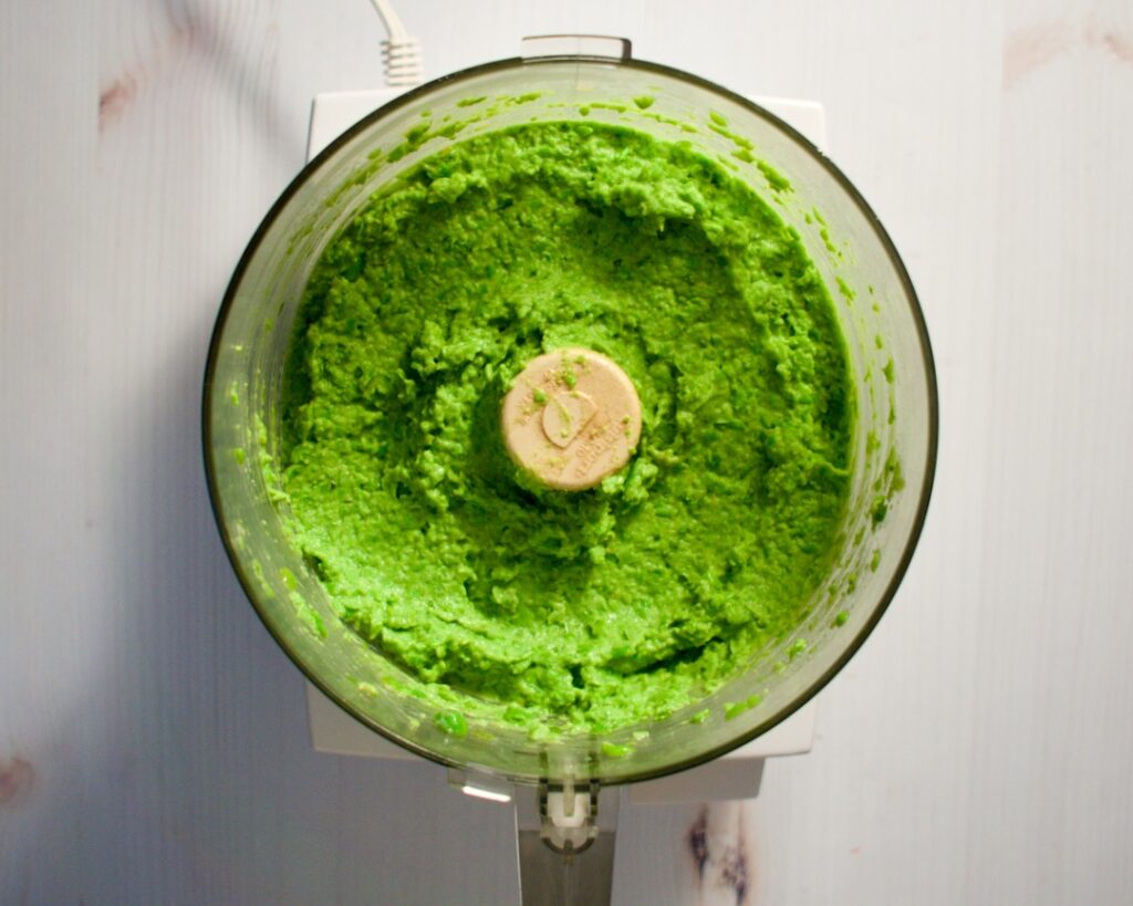 Pea dip blended in a food processor.