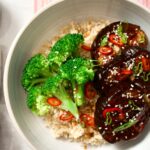 Bowl with rice, eggplant and broccoli.